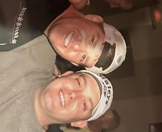 Friends enjoy a fun evening together, capturing a moment of happiness at a social event.