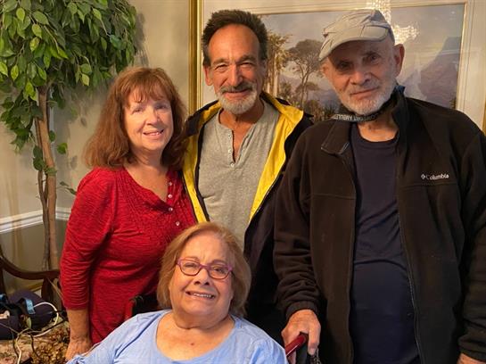 A group of people posing for a photo