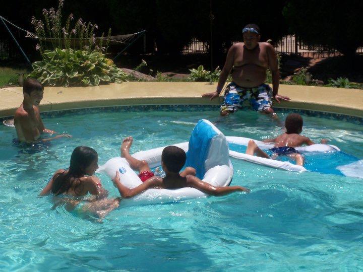 A group of kids in a pool