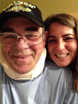 A man and woman smiling for a selfie