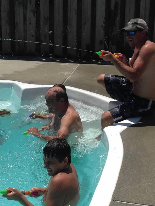 A group of people in a hot tub