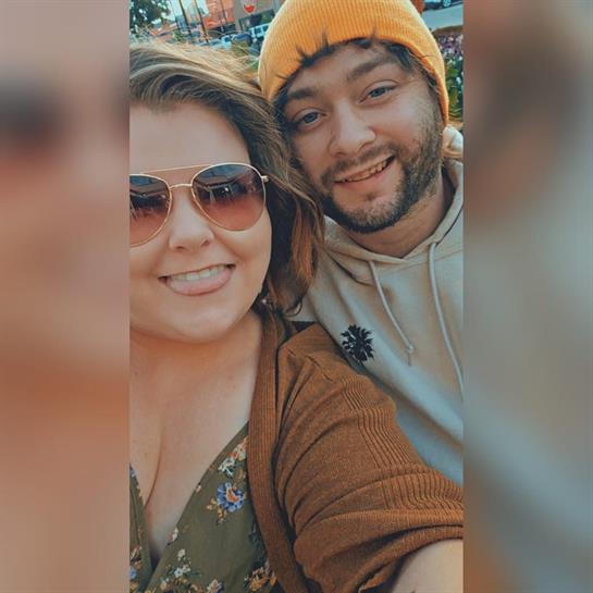 A man and woman taking a selfie