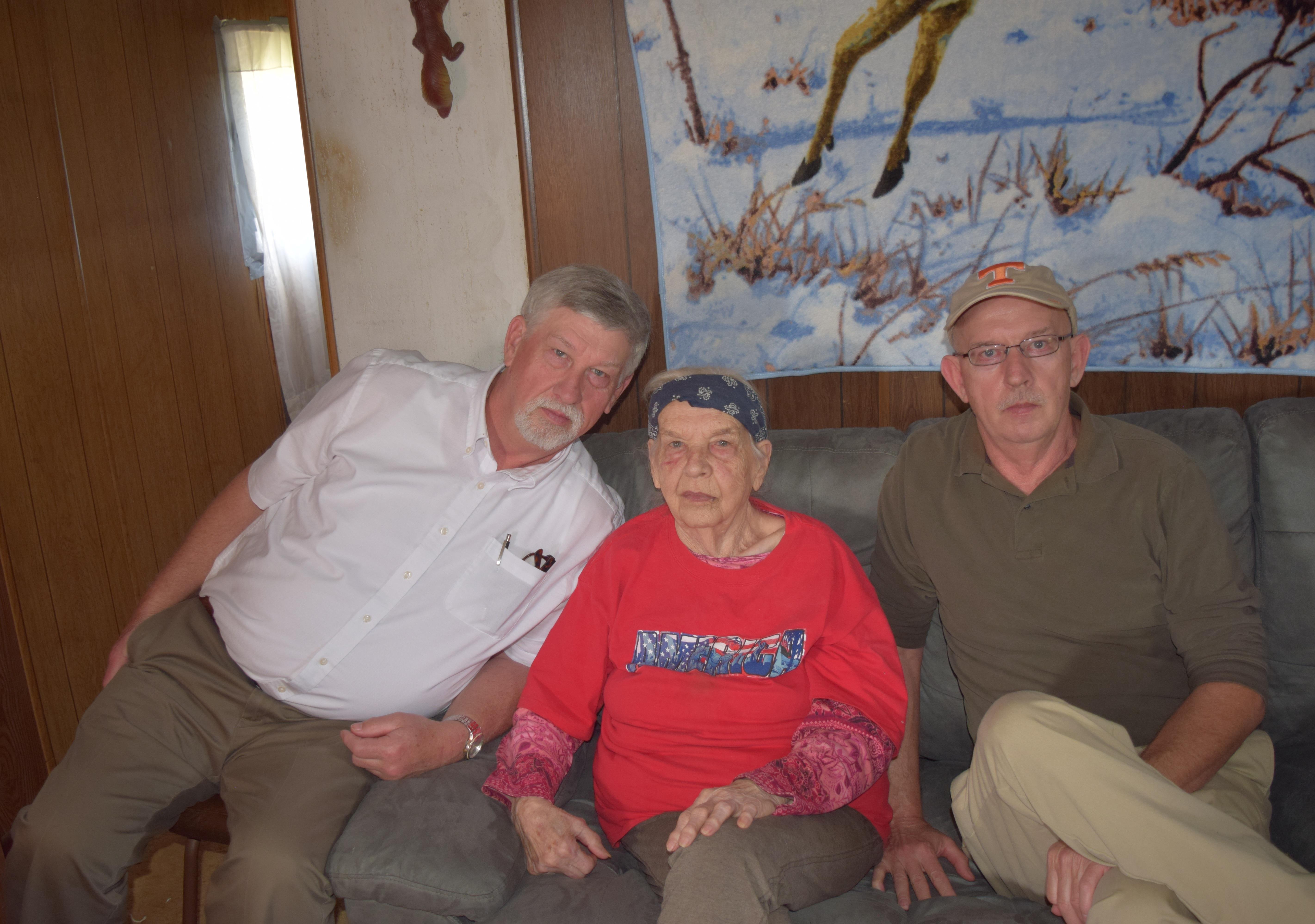 Family spends quality time together in a warm living area, enjoying winter gatherings.