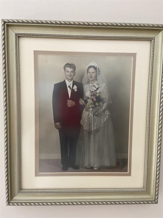 A framed picture of a man and woman