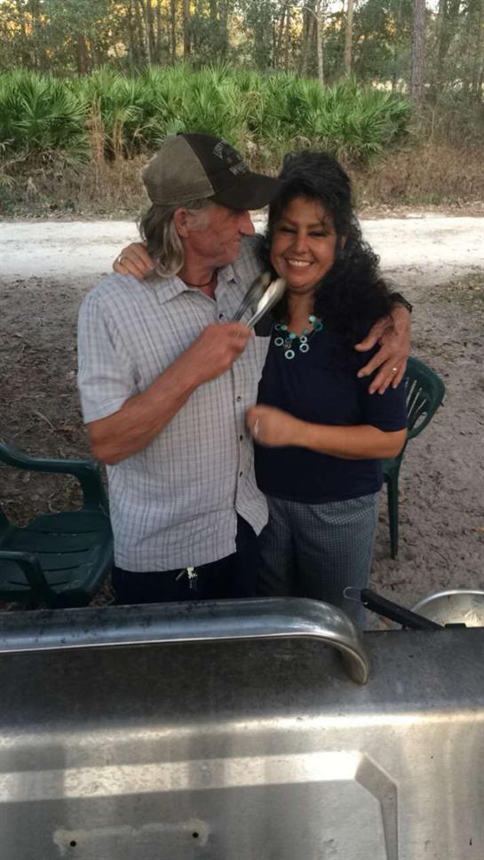A man and woman hugging