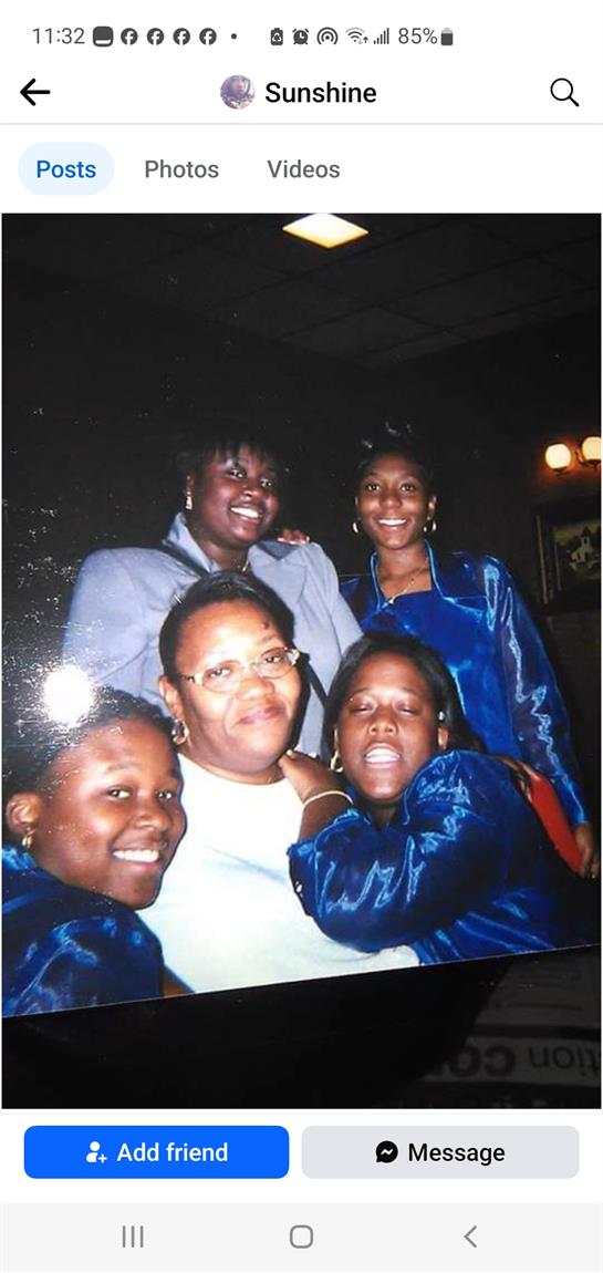 A group of women posing for a photo