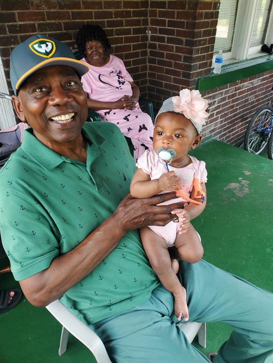 A man holding a baby