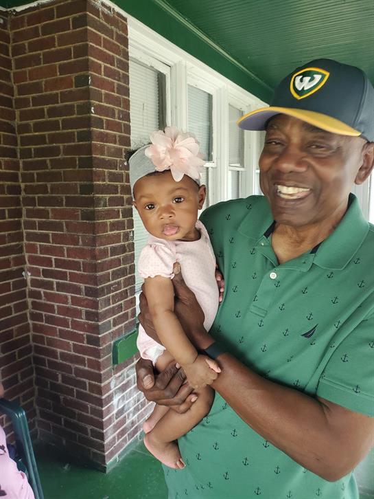 A man holding a baby