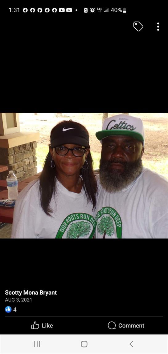 A man and woman posing for a picture