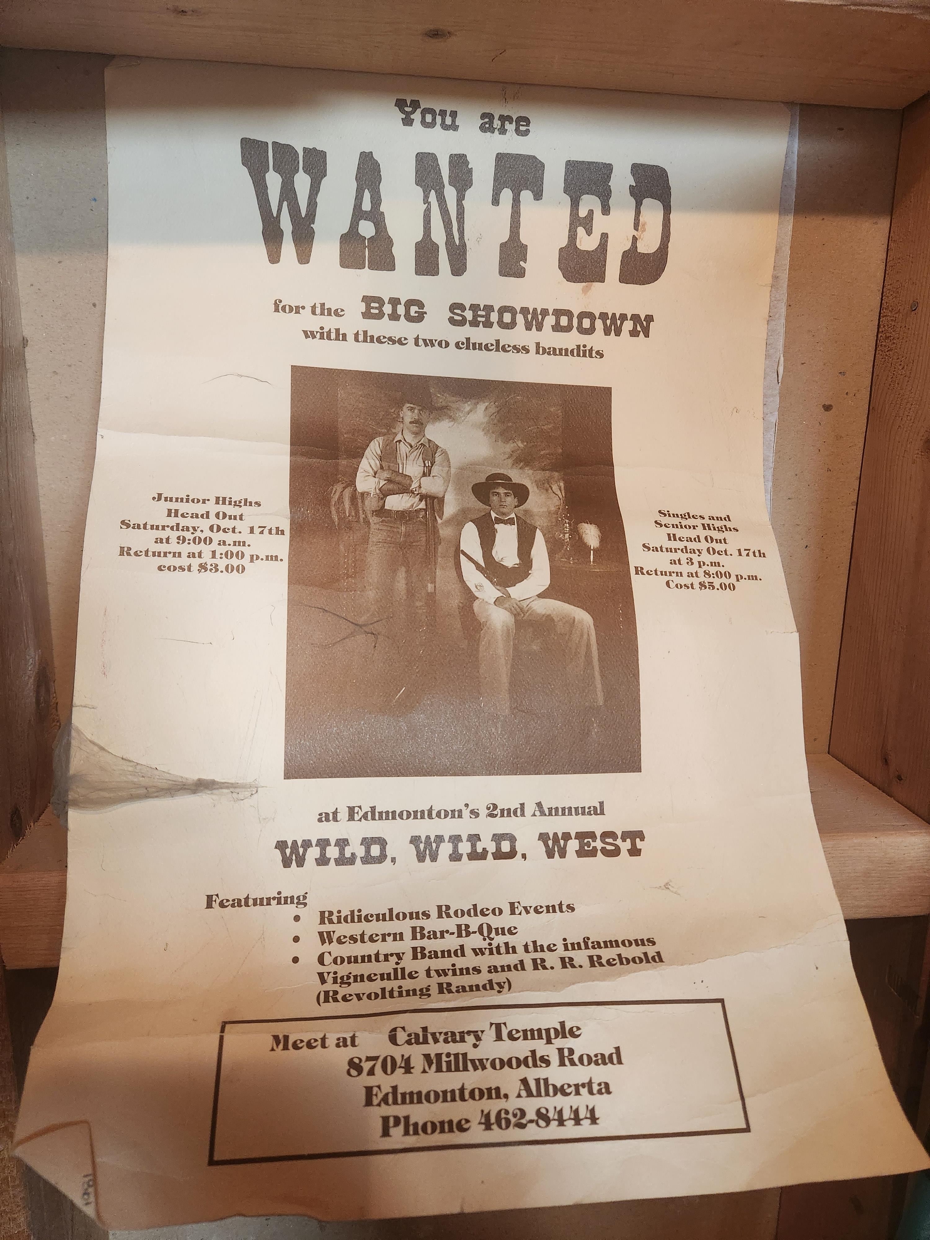 A wanted poster announces a showdown event in Edmonton featuring rodeo activities and entertainment.