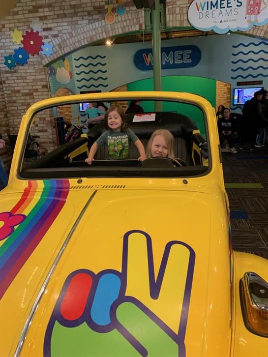 Two children in a car