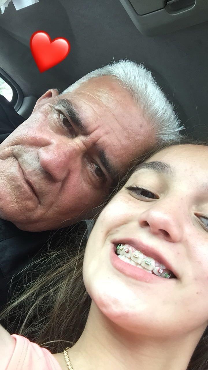 A man and girl taking a selfie