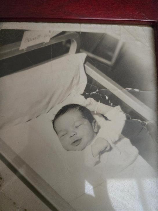 A baby in a crib