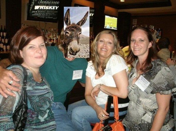 Four friends smile and pose for a fun moment at a bar with unique outfits and expressions.