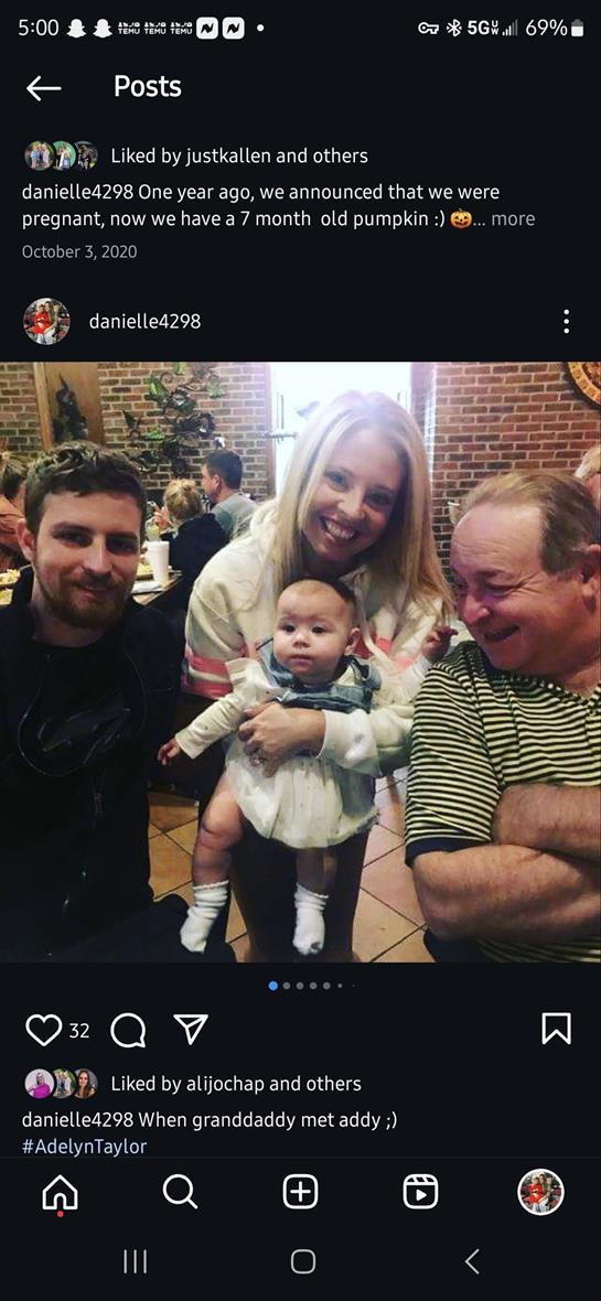 A family enjoys time together at a restaurant while sharing laughter and smiles.