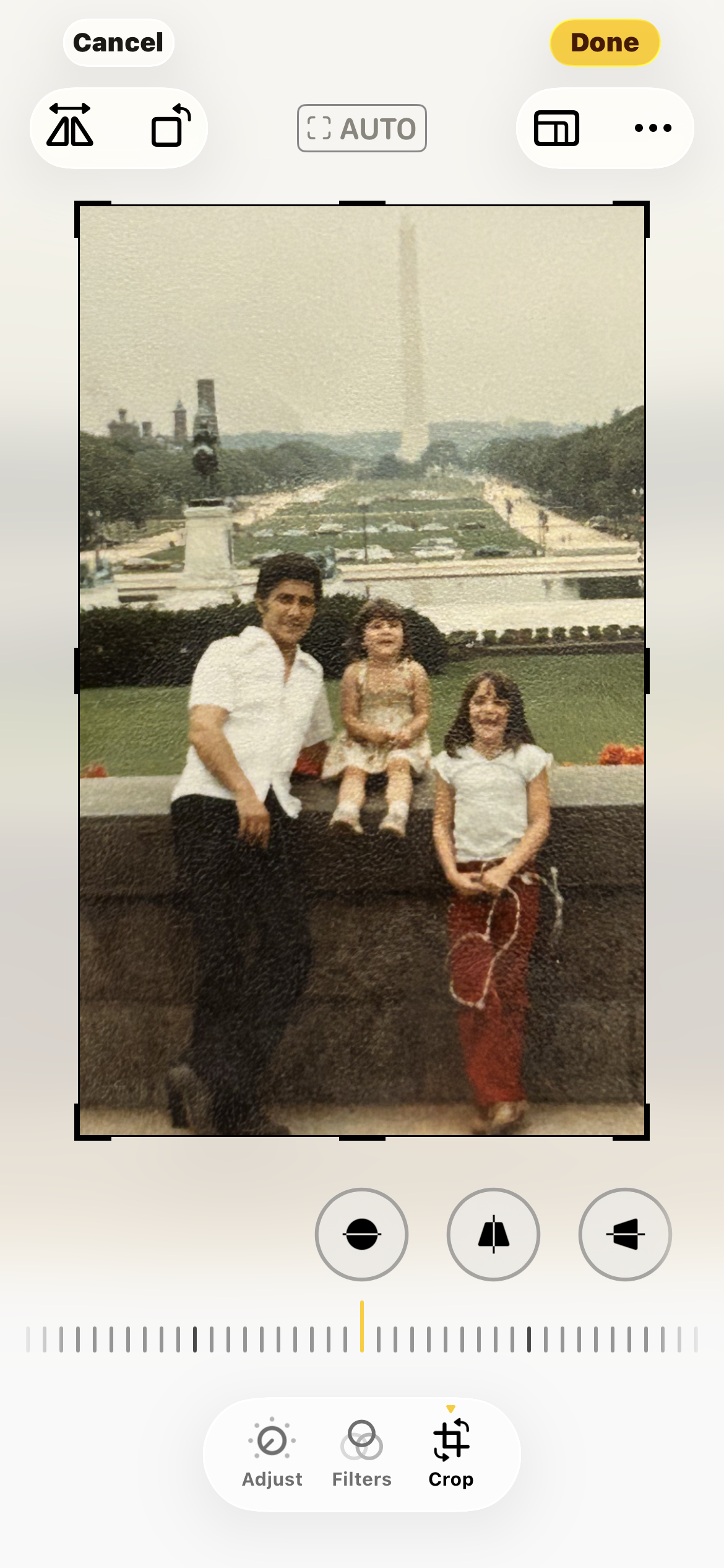 A man and two girls posing for a picture