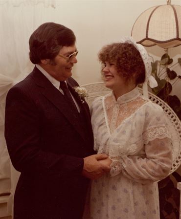A man and woman holding hands