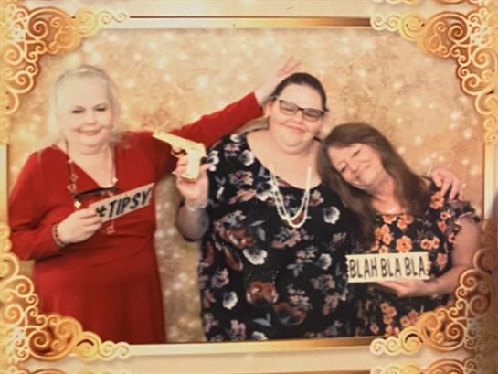 A group of women posing for a photo