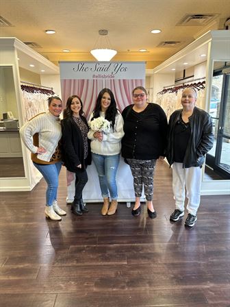A group of women posing for a photo