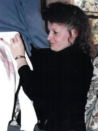A woman looking at a man