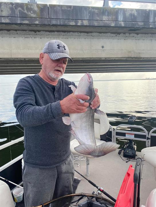 A man holding a fish