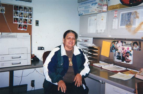 A woman sitting at a desk