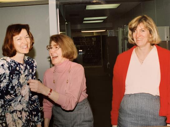 A group of women standing in a hallway