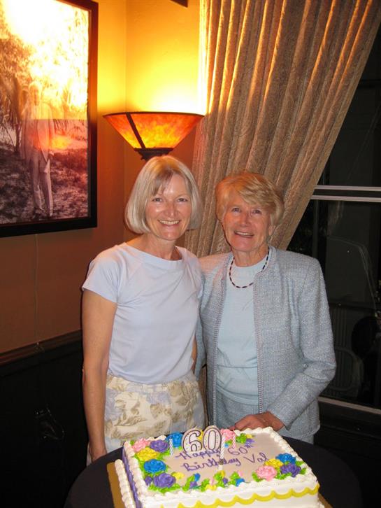 Two women standing next to each other