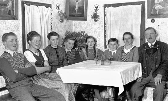 A group of people sitting at a table