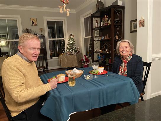 A man and woman sitting at a table