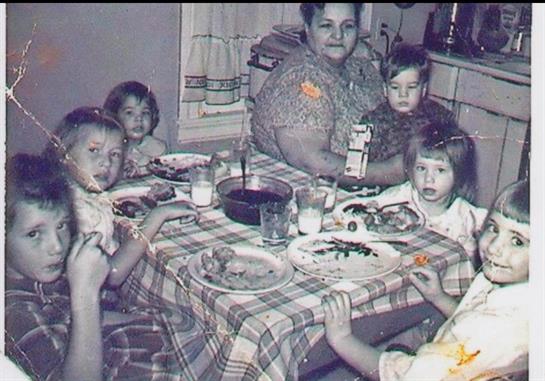 A group of people eating at a table