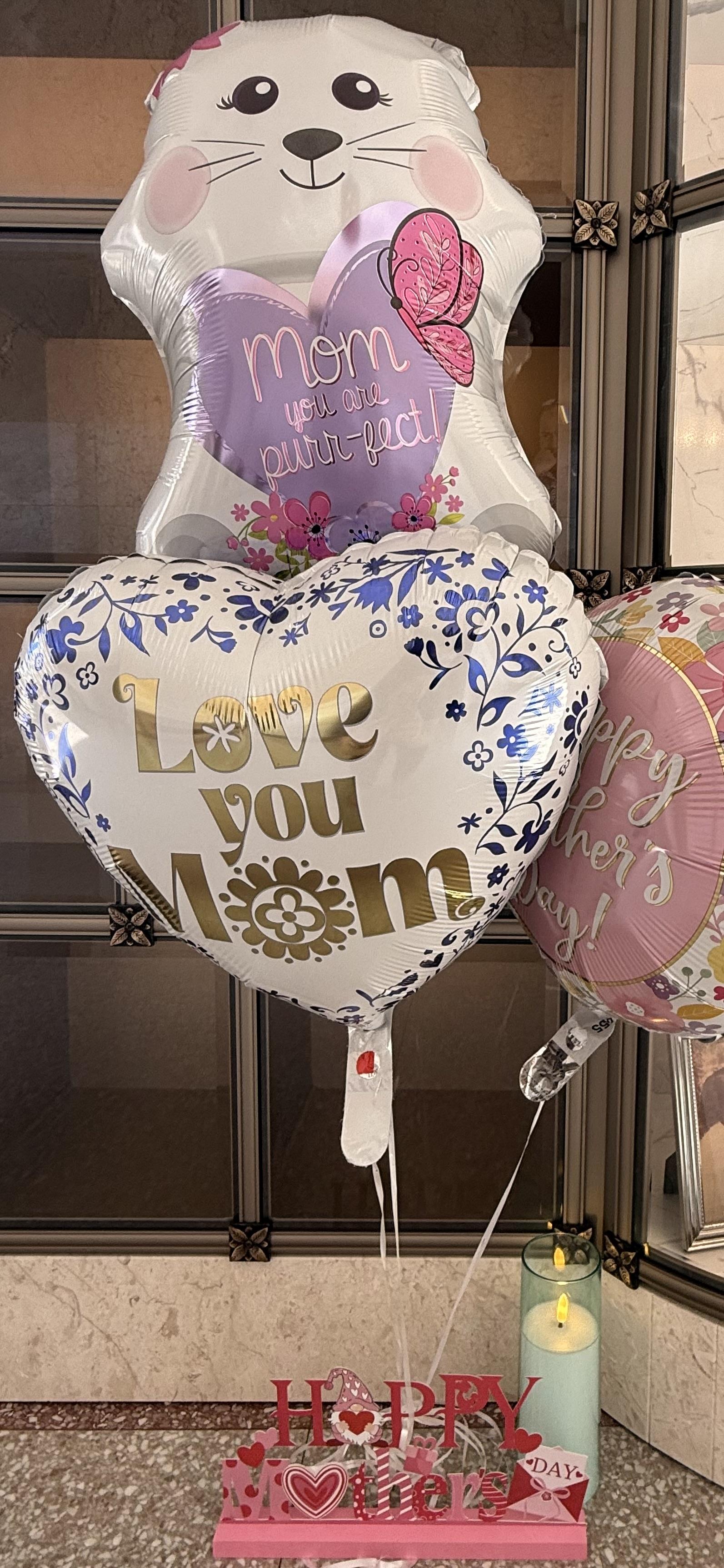 A heart shaped balloons with text