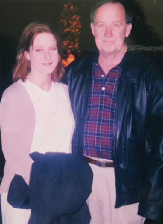 A man and woman posing for a picture