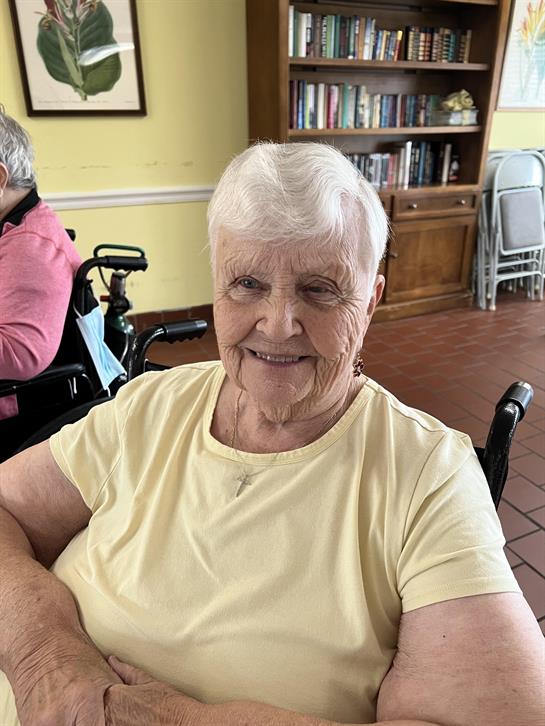 An old woman in a wheelchair