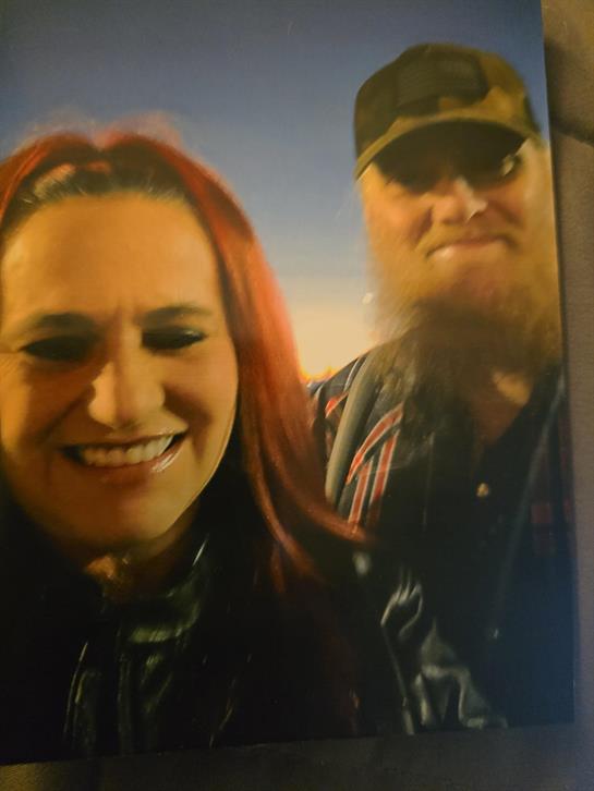A man and woman taking a selfie
