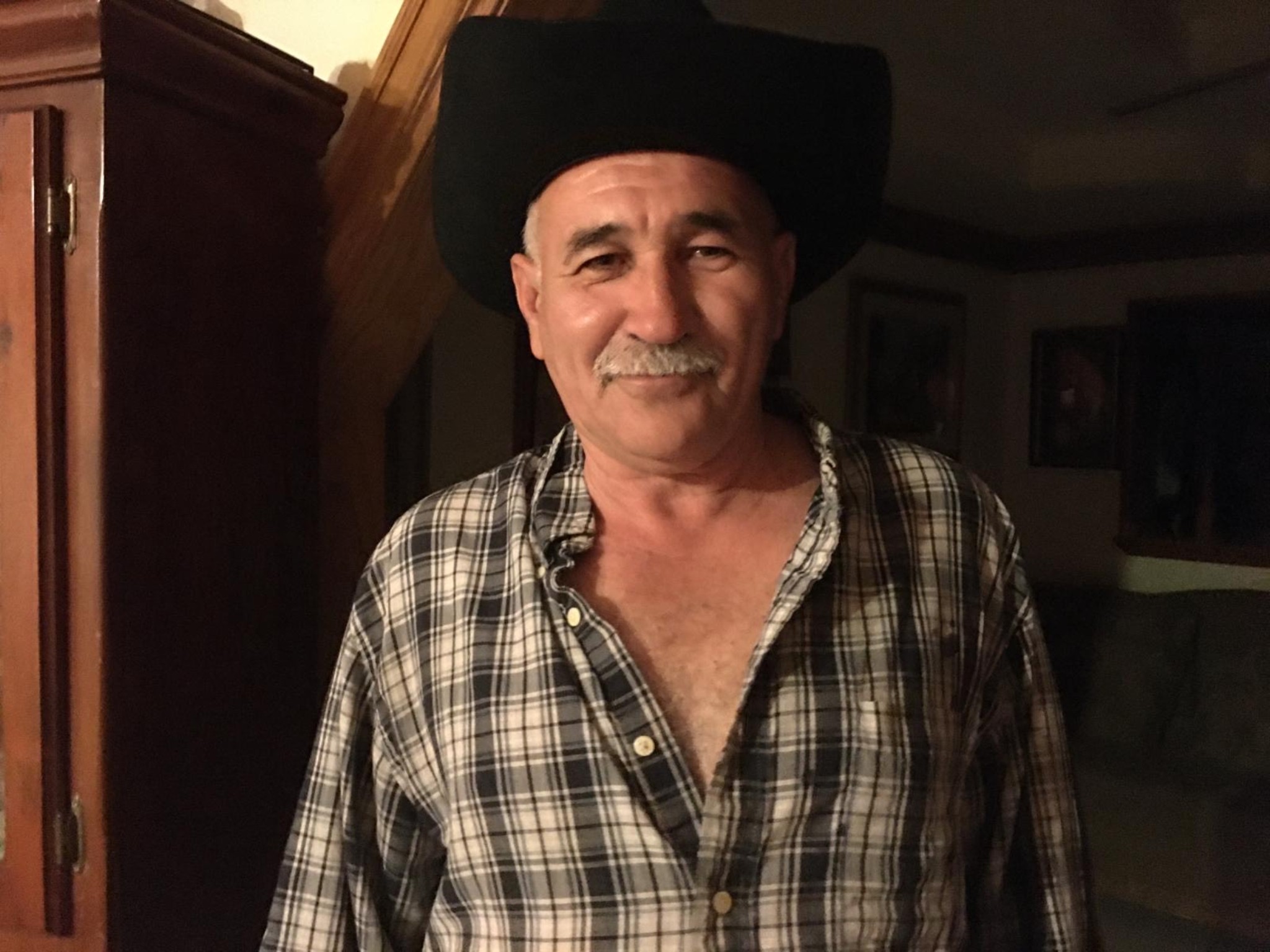 A man wearing a cowboy hat