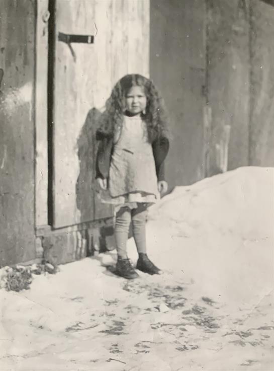 A girl standing in the snow