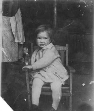 A child sitting in a chair