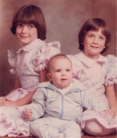 A group of children posing for a picture