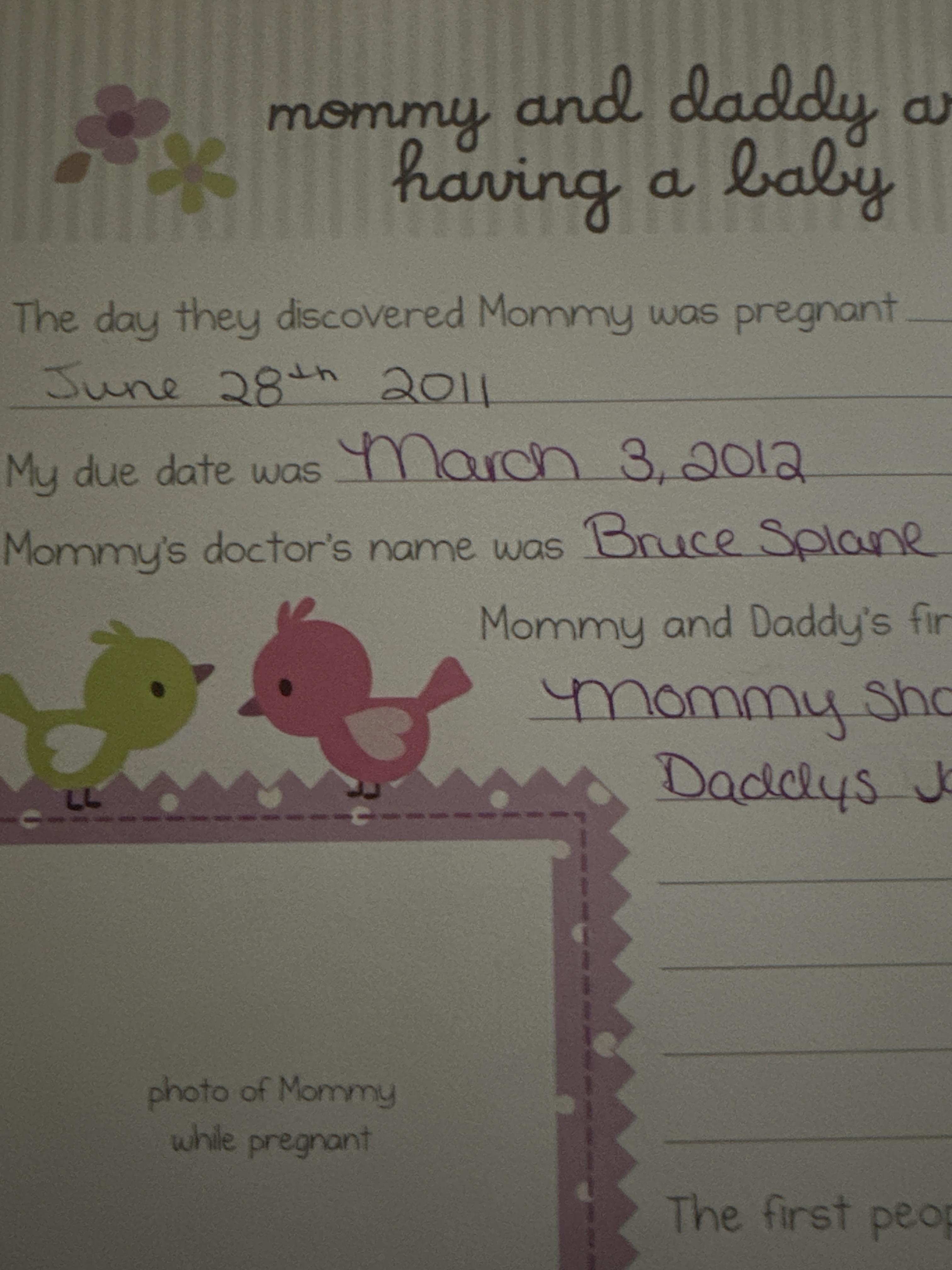 A baby announcement card with birds and text