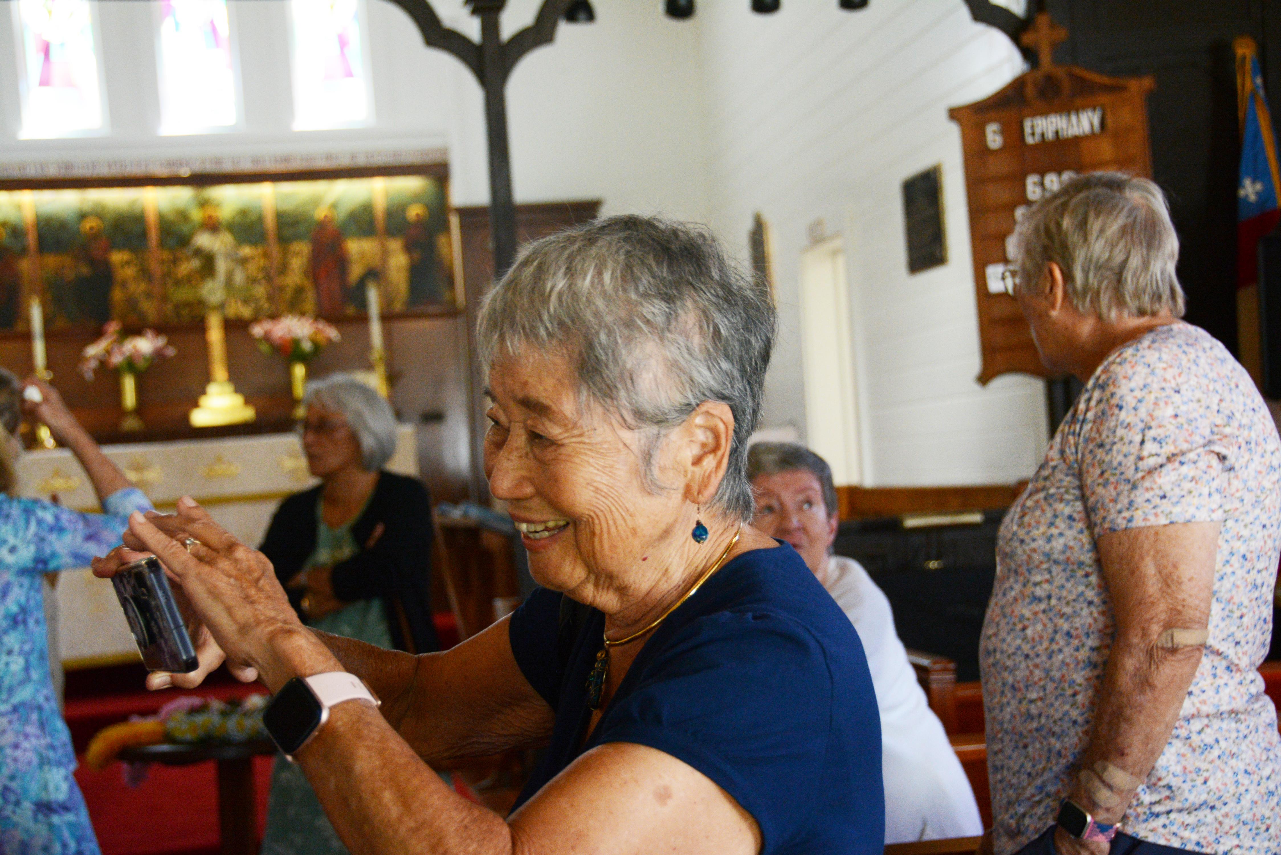 People are interacting and having a pleasant time in a cafe setting, showcasing joy.