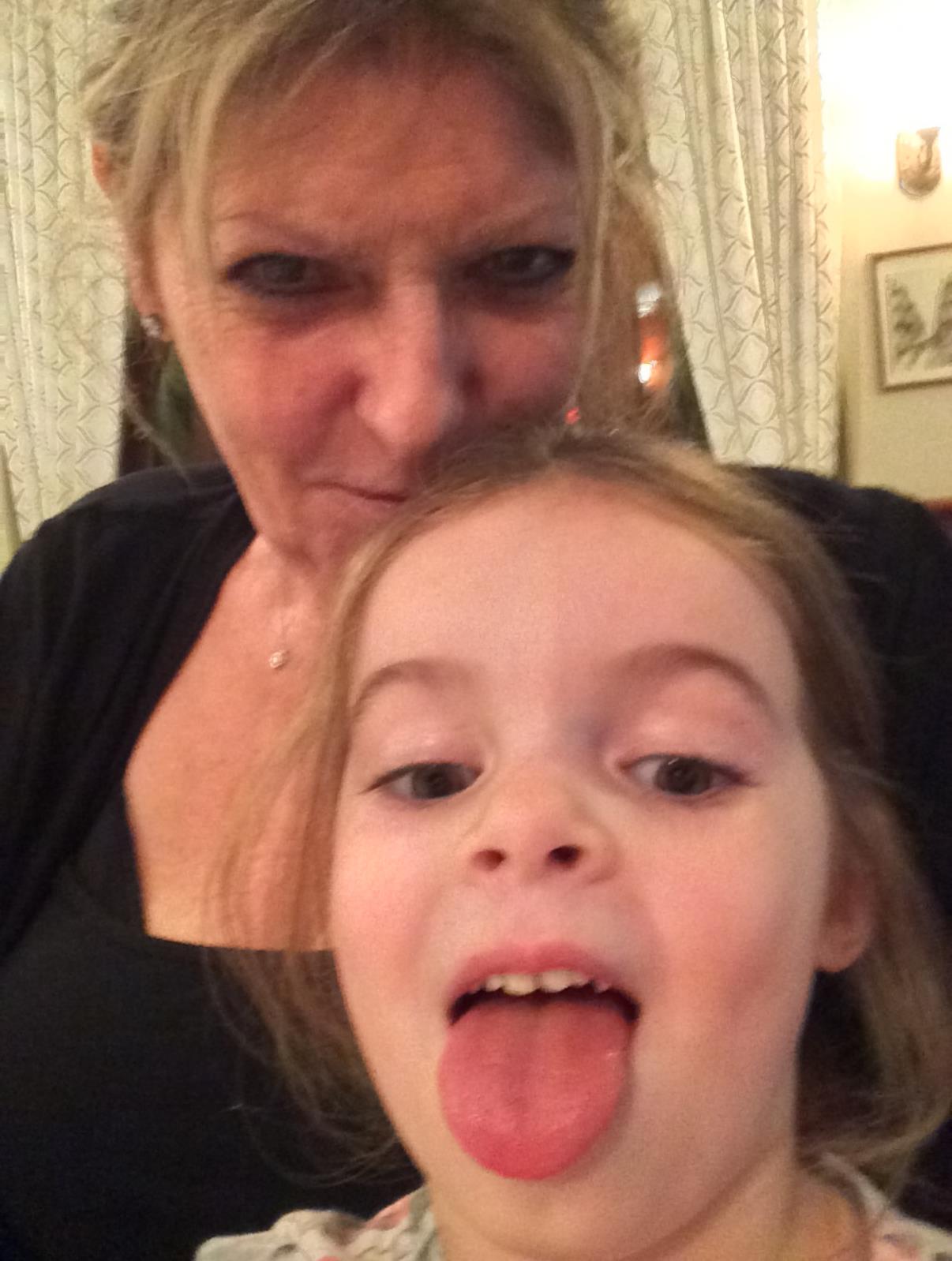 A woman and a child taking a selfie