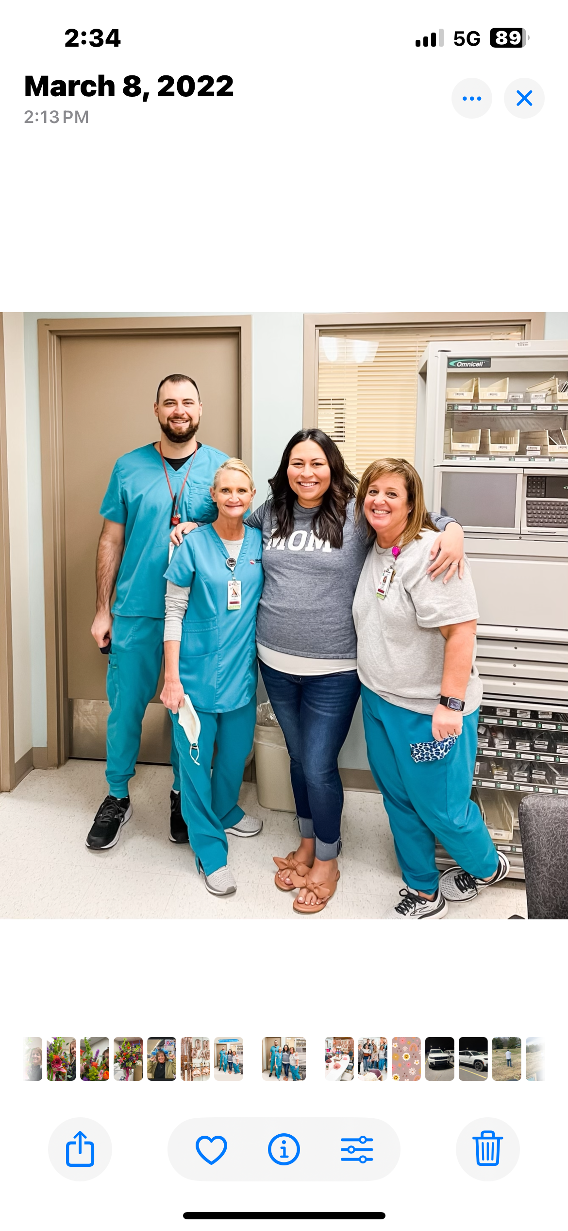 Four health care workers share smiles and camaraderie after a busy day at the clinic.