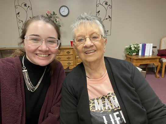 Two women smiling at the camera