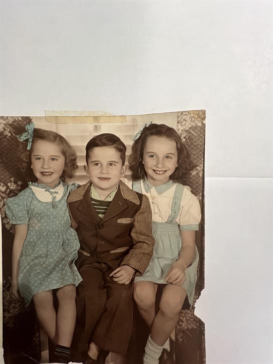 A group of children sitting together