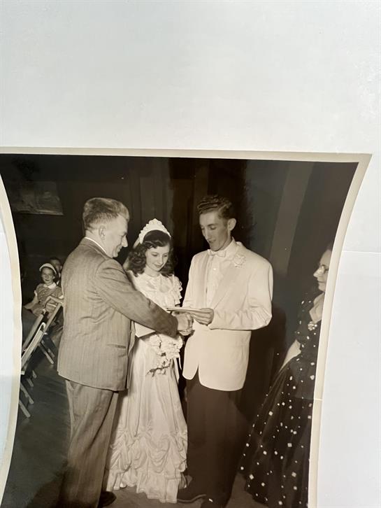 A man and woman standing next to each other