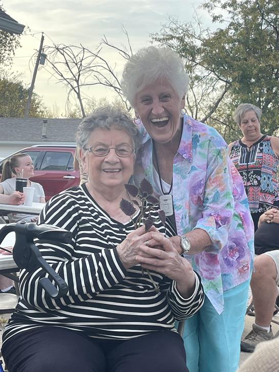 Two women smiling at the camera