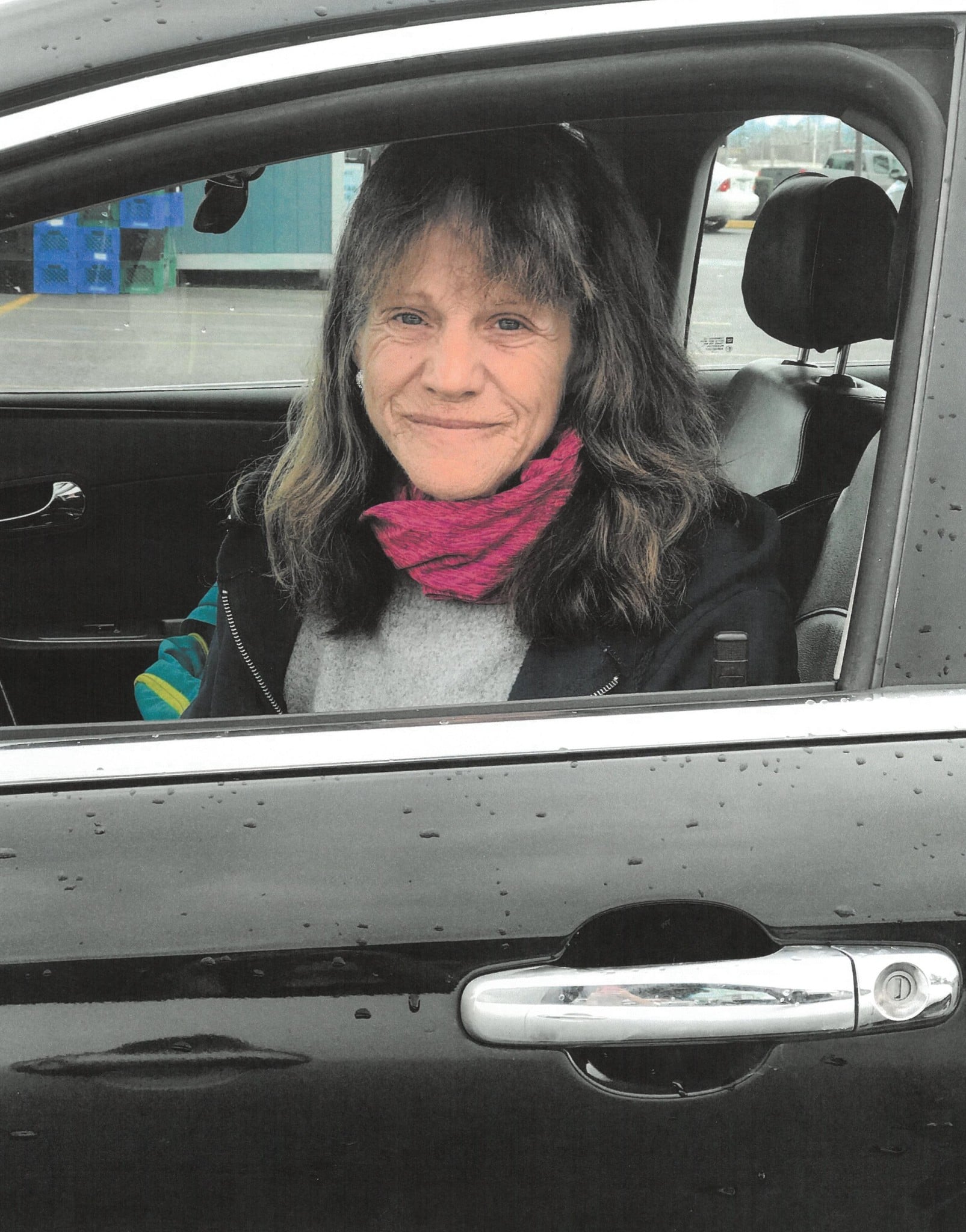 A woman sitting in a car