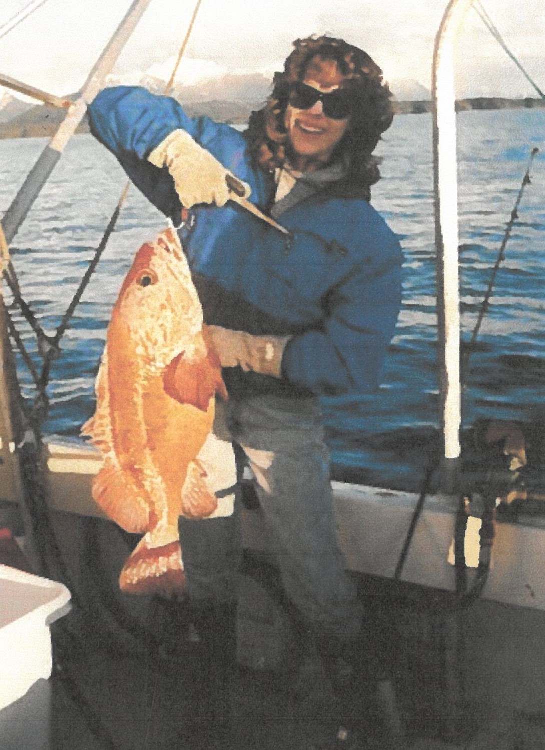 A woman holding a fish