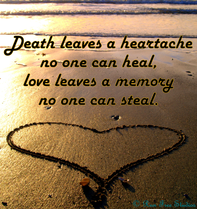 Sand is shaped into a heart on a beach, reflecting a heartfelt message about love and loss.